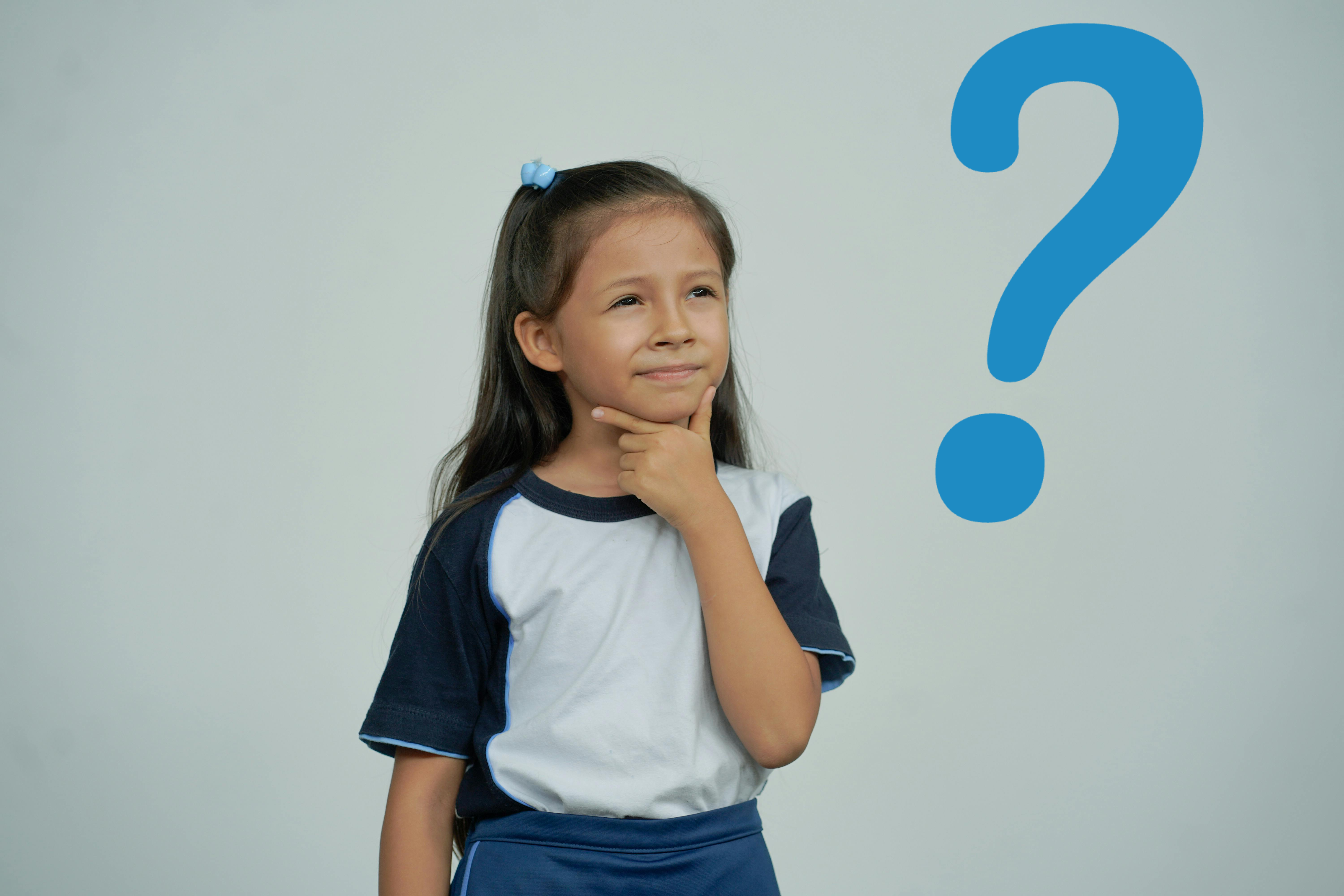 A child thinking with a confused expression. There is a large blue question mark above her.